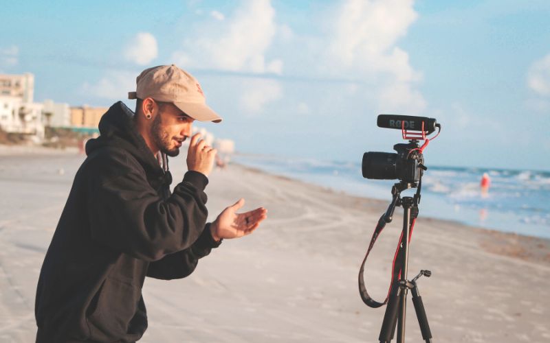 What is a content creator man films on beach